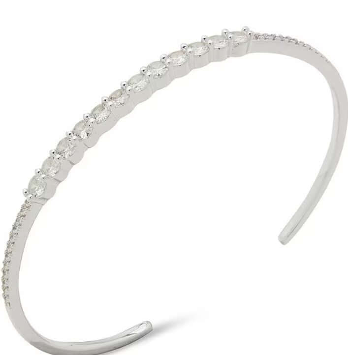 Anne Klein silver tone thin cuff bracelet with crystal detailing, perfect for elegant outfits and special occasions.